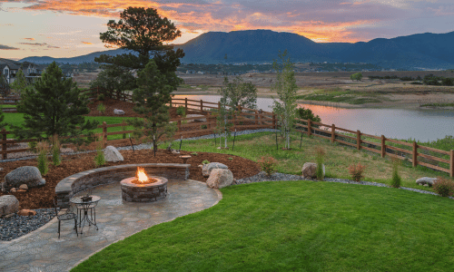 a built in firepit on a gorgeous property